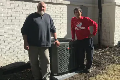 Customers with their new outdoor unit