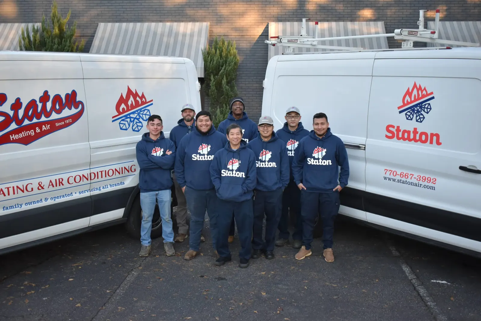 The Staton team with the service fleet