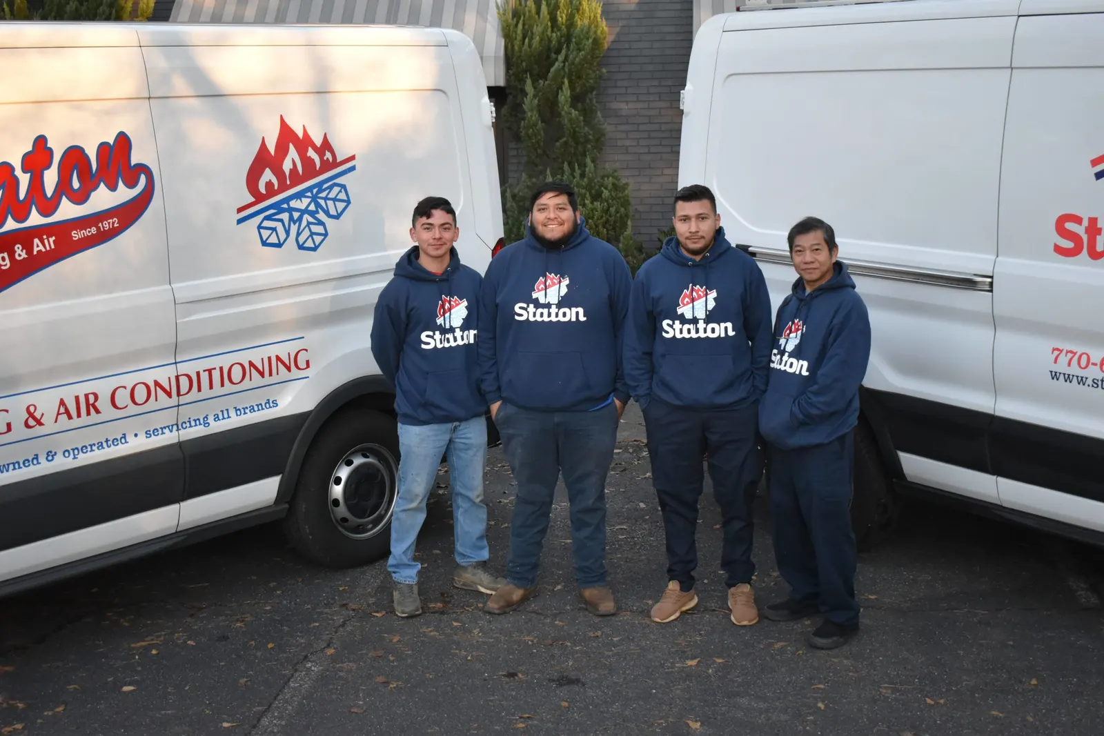 Team members in front of a Staton service van